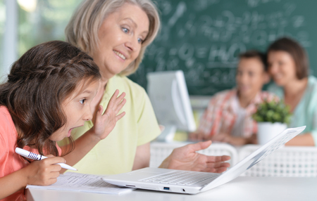 Teachers working with pupils