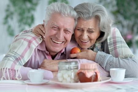 Senior couple drinking teaの写真素材