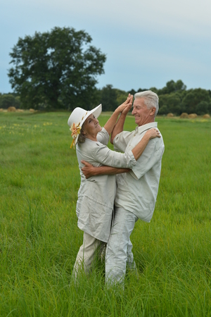 Senior couple resting at parkの写真素材