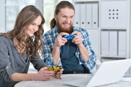 Young couple with laptopの写真素材