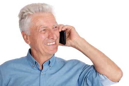 Portrait of senior man talking on phoneの写真素材