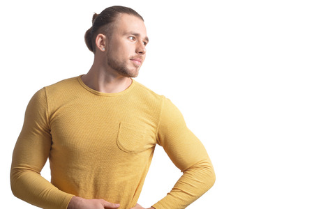 Portrait of a handsome young man posing on white backgroundの写真素材