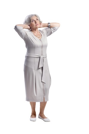 Portrait of beautiful senior woman on white backgroundの写真素材