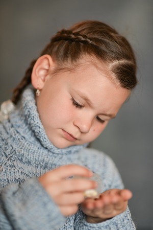 cute sick  girl  taking medicinesの写真素材