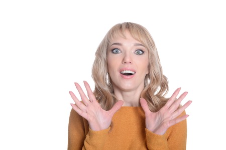 portrait of beautiful happy woman posing on white backgroundの写真素材