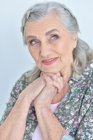 close up portrait of happy senior woman  at homeの写真素材