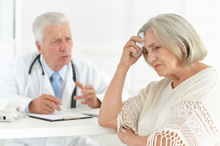 Senior doctor with a elderly patientの写真素材