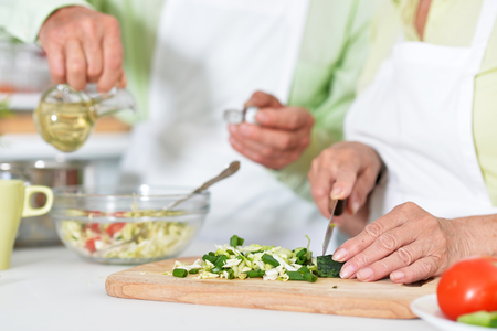 senior couple preparing dinnerの写真素材