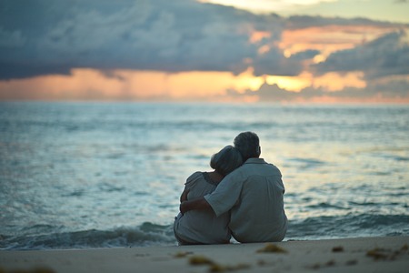 Happy elderly couple restingの写真素材