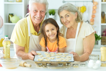 family in the kitchen preparing