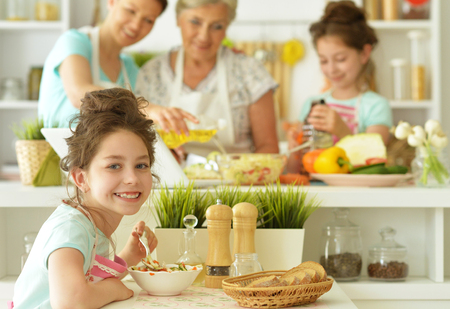 Family in the kitchen cookの写真素材