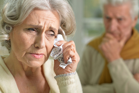 portrait of stressed senior woman cryingの写真素材