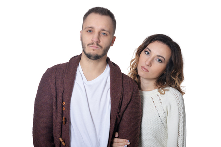 Portrait of young couple on white backgroundの写真素材