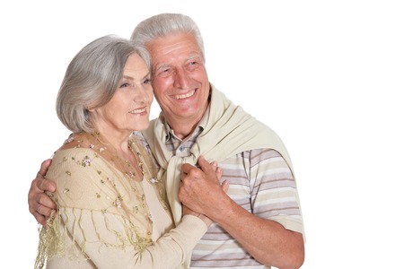 Portrait of happy senior couple holding hands isolated