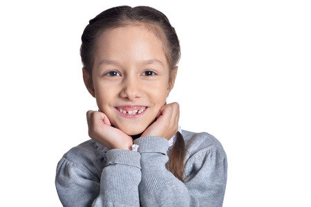 Cute little girl posing isolated on white background