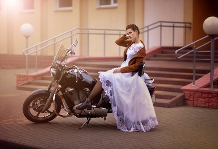 Portrait of beautiful young bride in white dressの写真素材