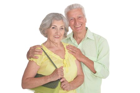 Portrait of happy senior couple on white backgroundの写真素材