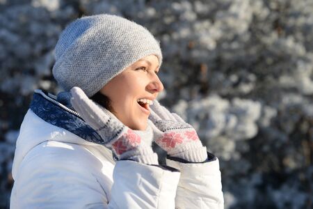 Close up portrait of happy young woman posing