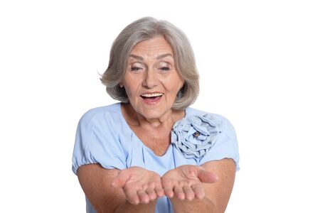 Beautiful senior woman isolated on black background