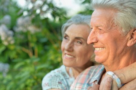 Close up portrait of beautiful senior couple posing