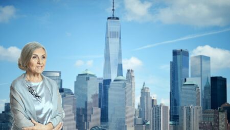 Portrait of smiling woman in a cityの写真素材