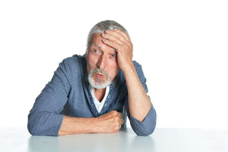 Emotional senior man isolated on white backgroundの写真素材