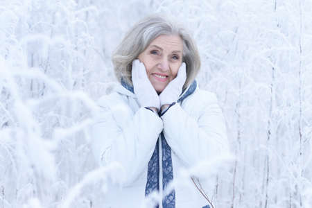 Close up portrait of happy beautiful senior womanの写真素材