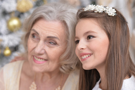 Portrait of a smiling grandmother and her granddaughter