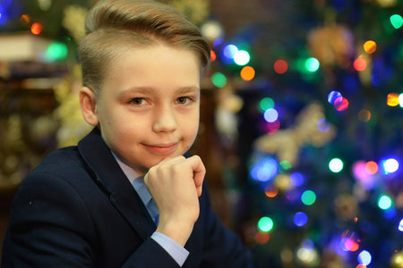 Portrait of little boy posing on Christmasの写真素材