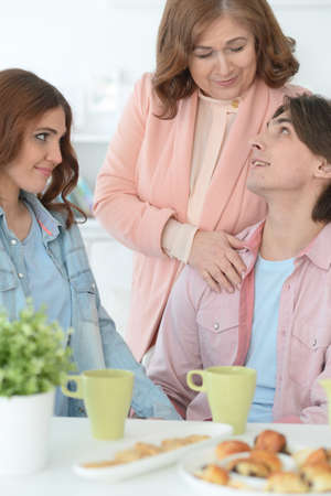 Family of three spending time together at dinner