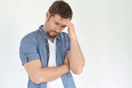 Portrait of handsome young man is sadの写真素材