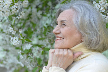 Portrait of happy smiling senior woman outdoorsの写真素材