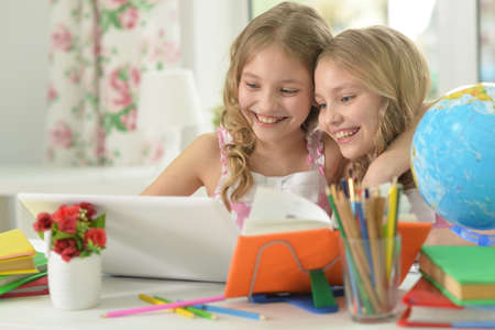 Portrait of cute girls on lessonの写真素材