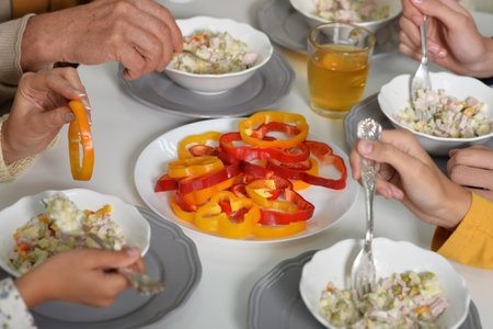 Family having lunch in kitchen at the table. Conceptの写真素材