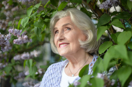 Portrait of a beautiful woman in the park in summerの写真素材
