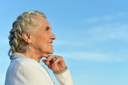 Portrait of an elderly woman in the parkの写真素材