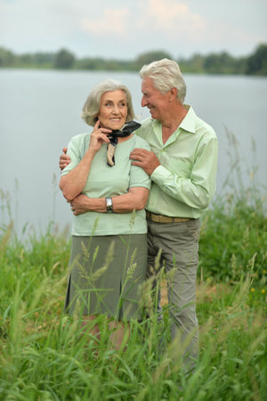 Loving mature couple in the park in summerの写真素材