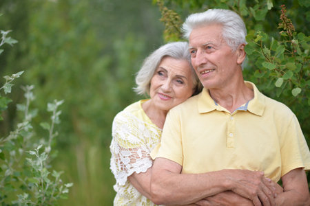 Loving mature couple in the park in summerの写真素材
