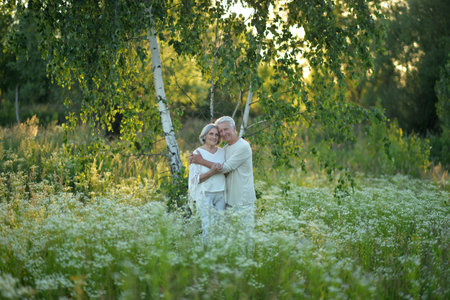 Loving mature couple in the park in summerの写真素材