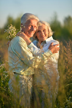 Loving mature couple in the park in summerの写真素材