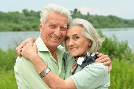 Loving mature couple in the park in summerの写真素材