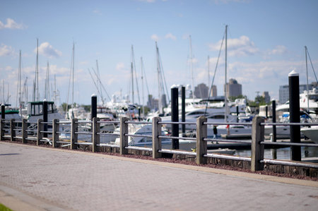 Marina Scene Illuminated. Urban Reflection Captures Peaceful Waterfront Sunrise Scene new york