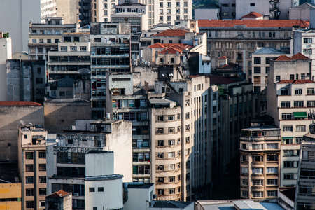 Detail of old and aged residential and business concrete constructions seen from the top of a business building.の写真素材