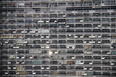 Detail of a facede of a huge office building with rectangular windows.の写真素材