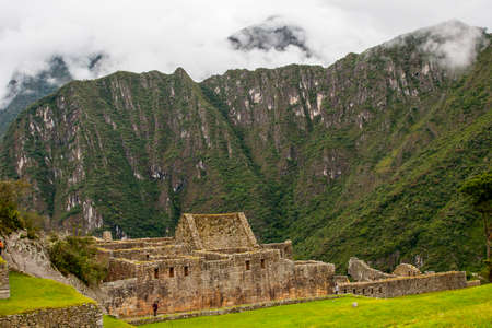 Ruins of Machu Picchu ancient lost city in the Andes nature. Moutains in mist. Peru. South America. No people.の写真素材