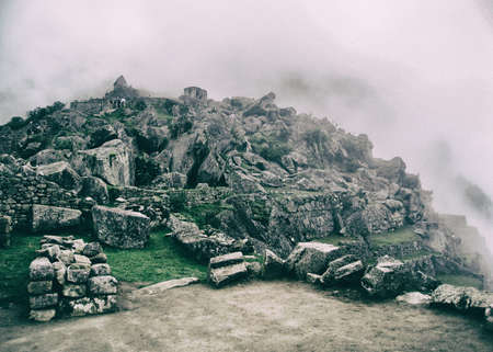 Stone magical ancient ruins along the paved path Inca Trail to Machu Picchu in Peru.の写真素材