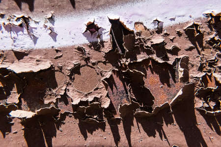 Old worn metal surface with paint. Rusty metal texture background. Perfect grunge wallpaper. No people.の写真素材