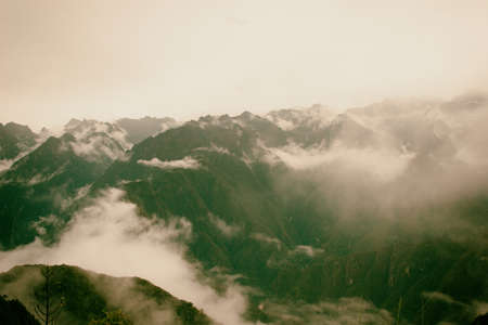 Panoramic inspirational view of the Andes mountains in mist on the Inca Trail. Peru. South America. No people.の写真素材