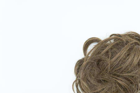 Brunette hair isolated on white background. Perfect copyspace.の写真素材