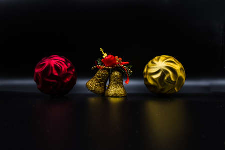 Cool holidays wallpaper background of Christmas decorations and balls or baubles on black background.の写真素材